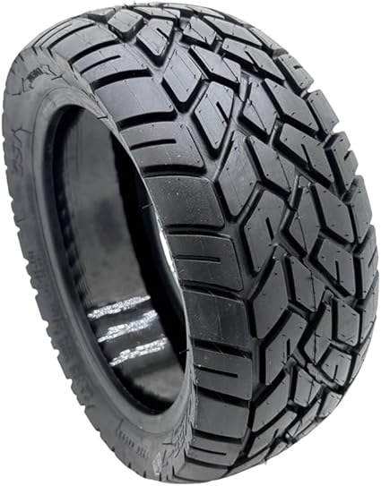 Tire with prominent tread pattern on a white background