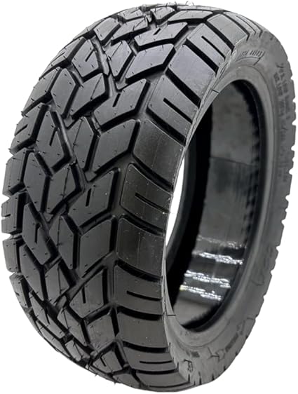 Tire with prominent tread pattern on a white background