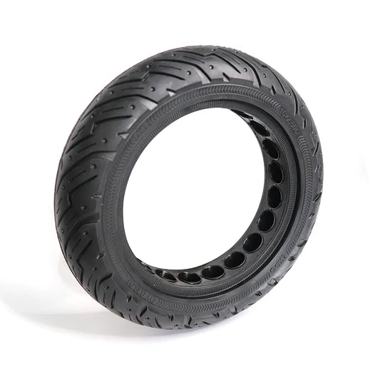 Black tire with unique tread pattern on a white background