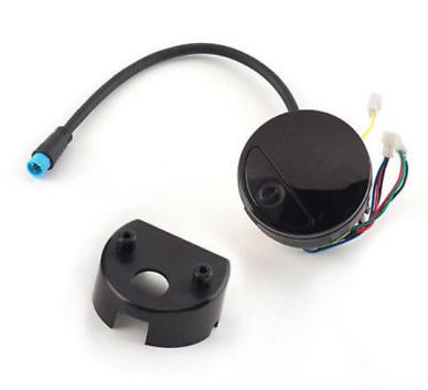 Two black mechanical components with wiring on a white background