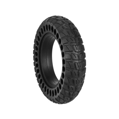 Black off-road tire with tread pattern on a white background