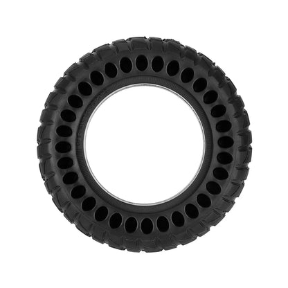 Black tire with tread pattern on a white background