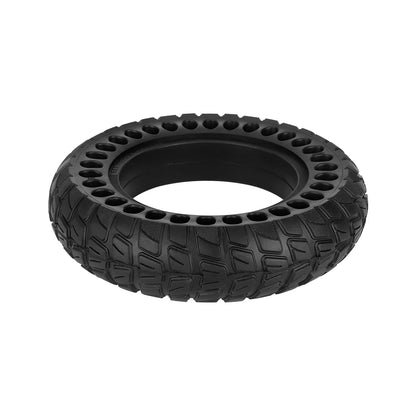 Black tire with unique tread pattern on a white background