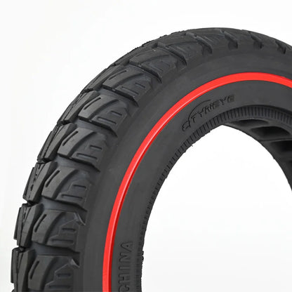 Black tire with red rim on a white background