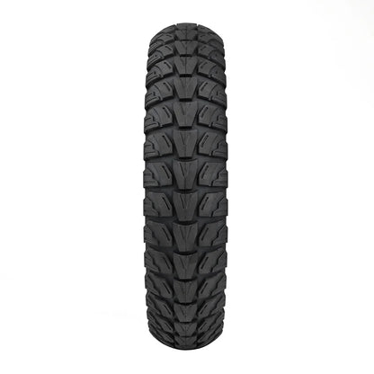 Black off-road tire with tread pattern on a white background