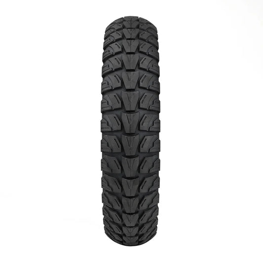 Black off-road tire with tread pattern on a white background
