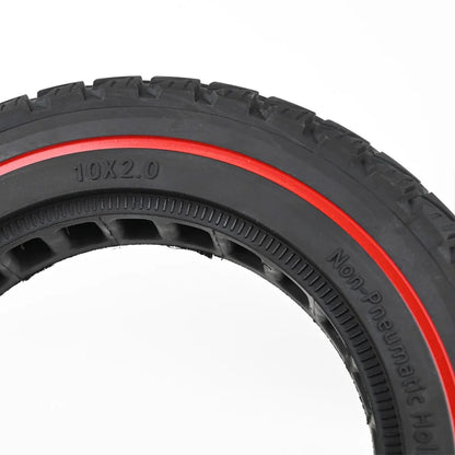 Black tire with red rim on a white background