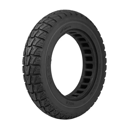 Black tire with tread pattern on a white background