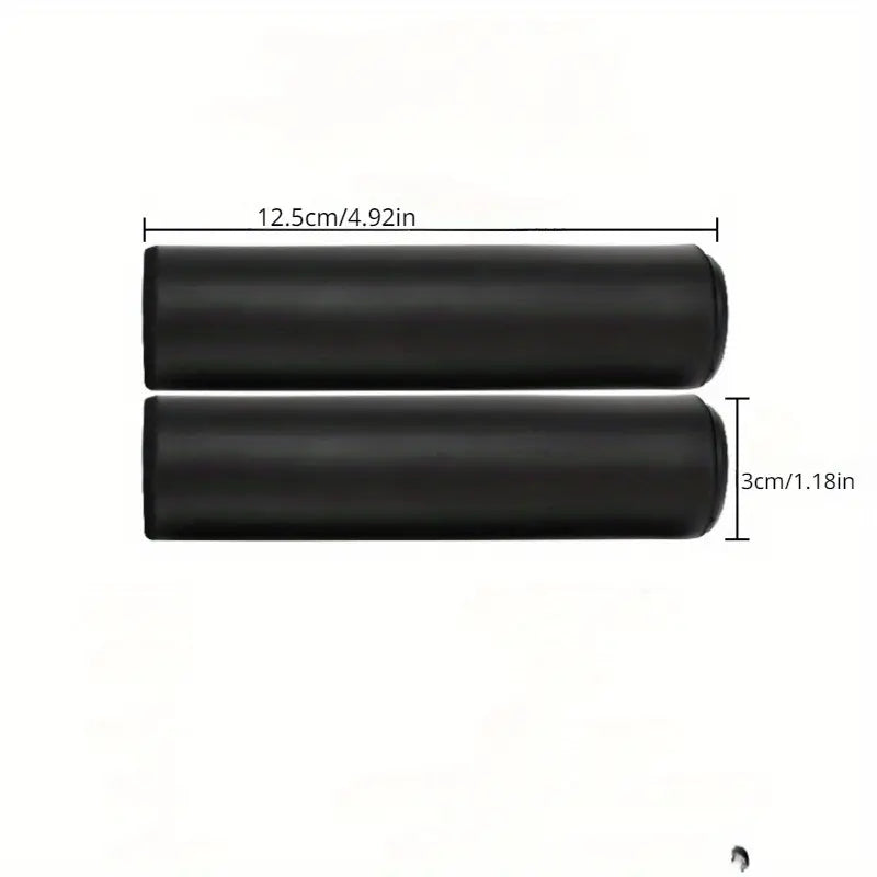 Two black cylindrical objects with measurements on a white background