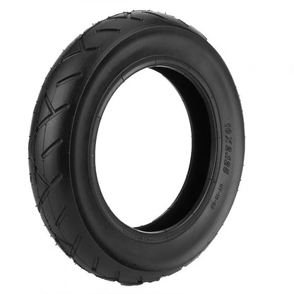 Black tire with tread pattern on a white background