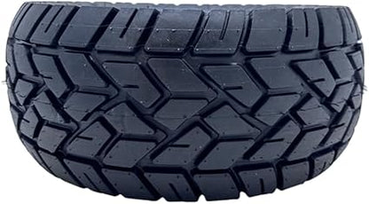 Close-up of a tire with tread pattern on a black background