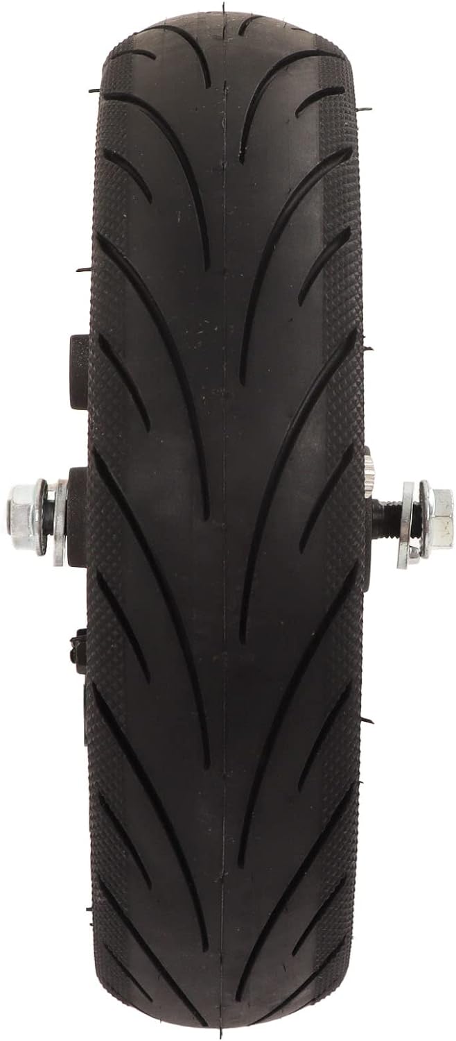 Black tire with tread pattern on a white background
