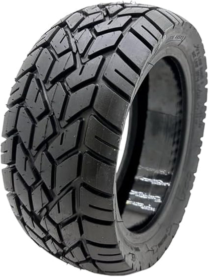 Tire with prominent tread pattern on a white background