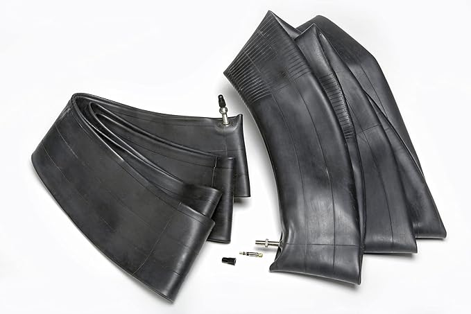 Two motorcycle tires and inner tubes on a white background