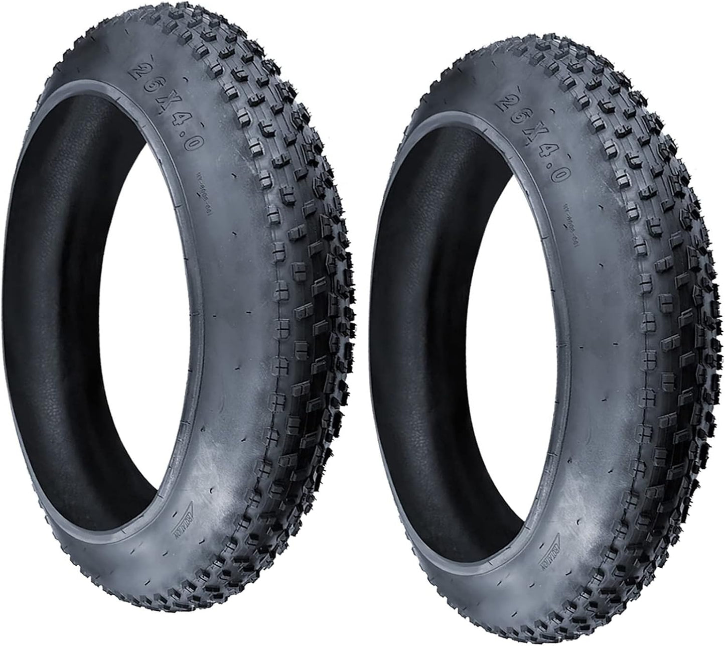 Two black off-road tires with tread pattern on a white background