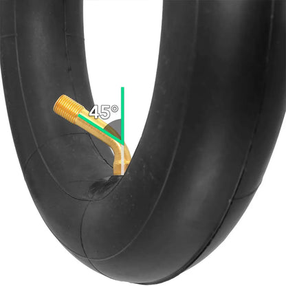Close-up of a tire with a valve stem and angle indicator on a white background