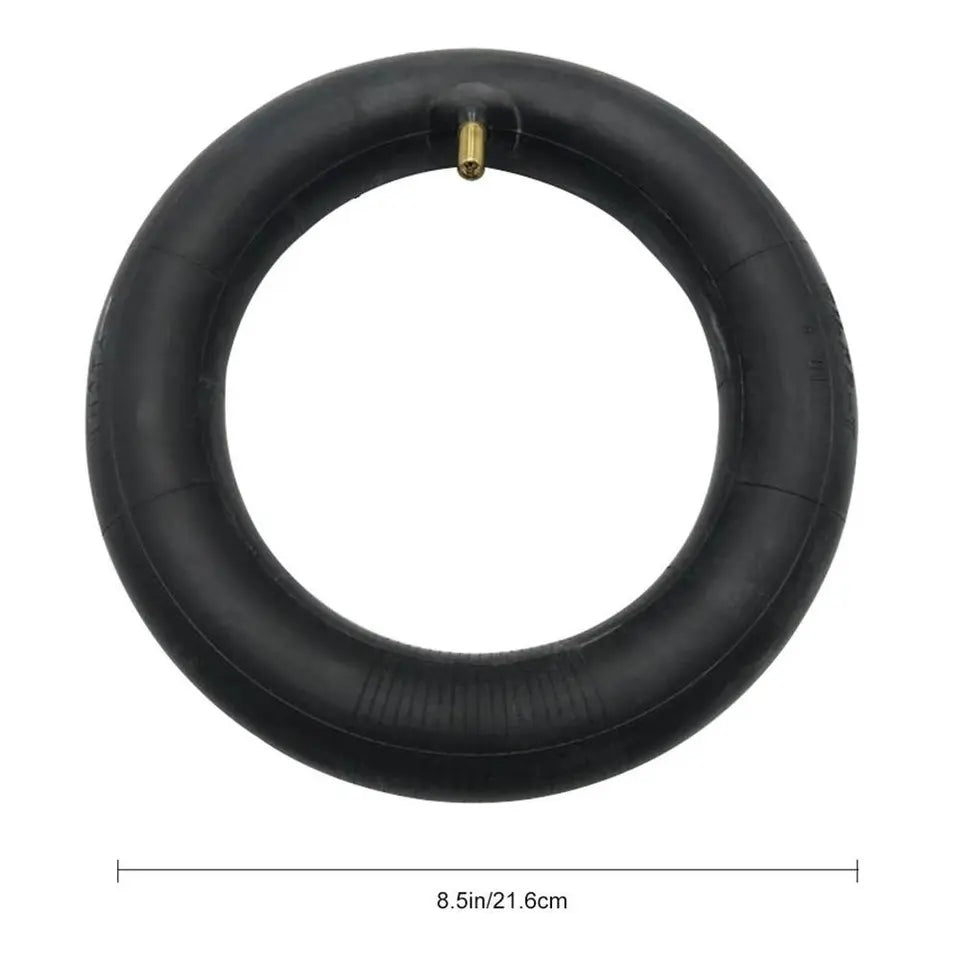 Black inner tube with valve on a white background