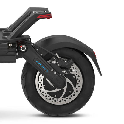 Close-up of a scooter wheel with visible branding on a white background