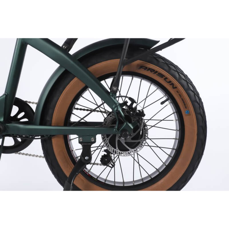 Close-up of a bicycle wheel with a white background