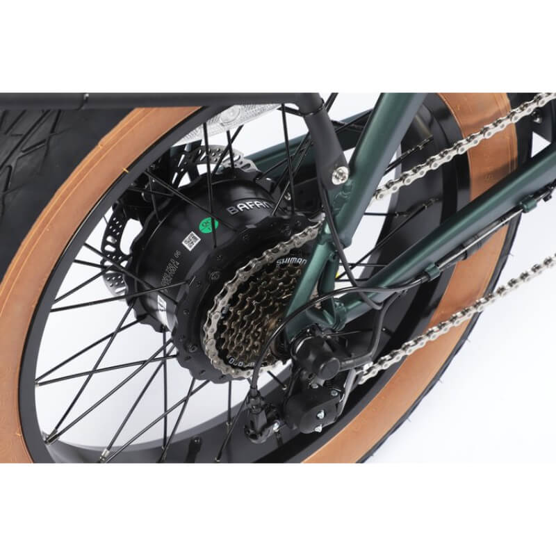 Close-up of a bicycle wheel with gear and chain on a white background