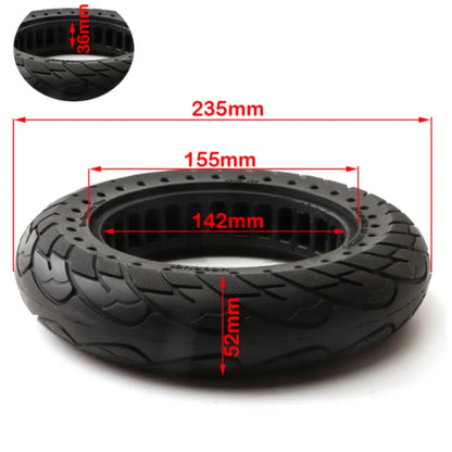 Black tire with measurements marked on a white background