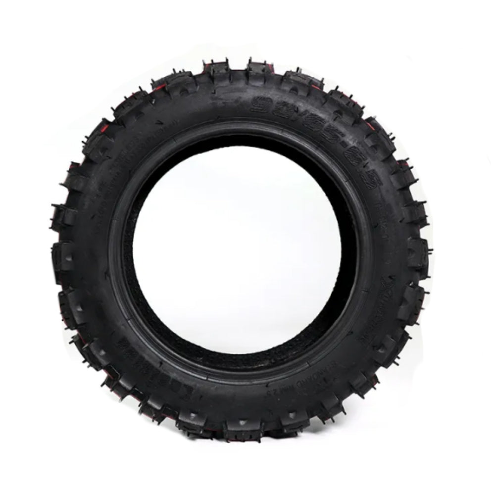 Black off-road tire on a white background