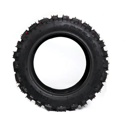 Black off-road tire on a white background