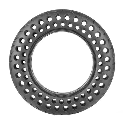 Black metal ring with circular holes on a white background