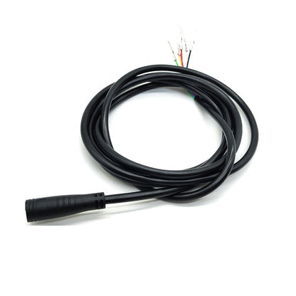 Coiled black cable with connectors on a white background