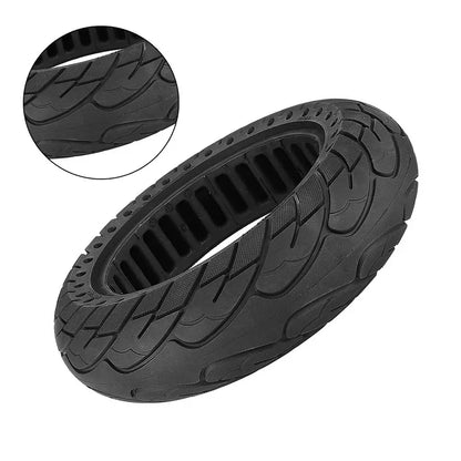 Black tire with detailed tread pattern on a white background