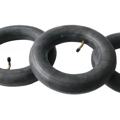 Three inner tubes stacked on a white background