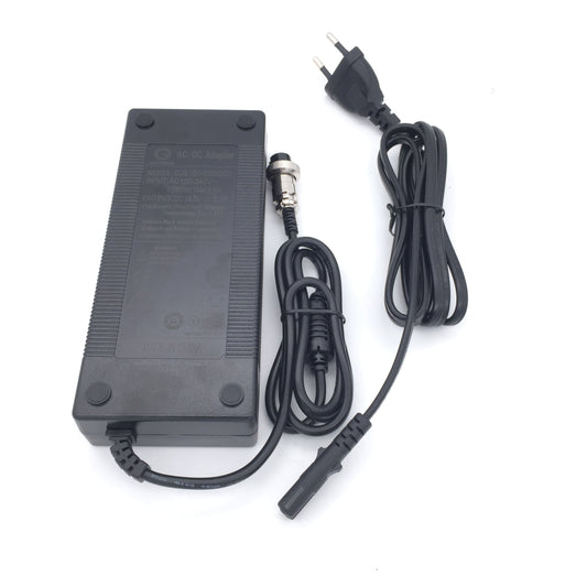 Black power adapter with multiple cables on a white background
