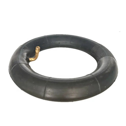 Black inner tube with a gold valve on a white background