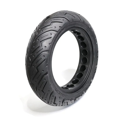 Black tire with unique tread pattern on a white background
