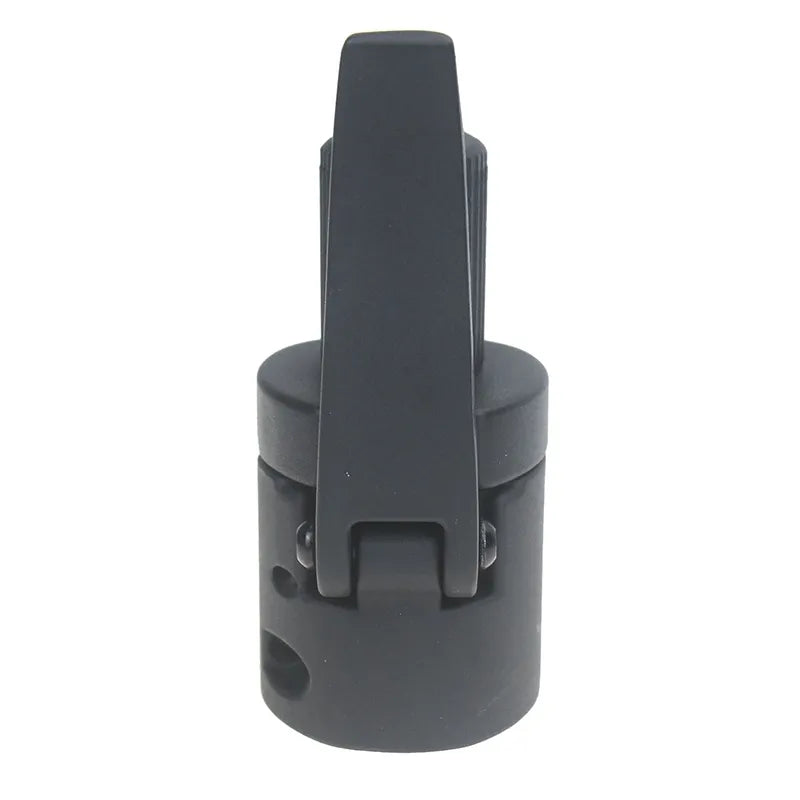 Black plastic component on a white background