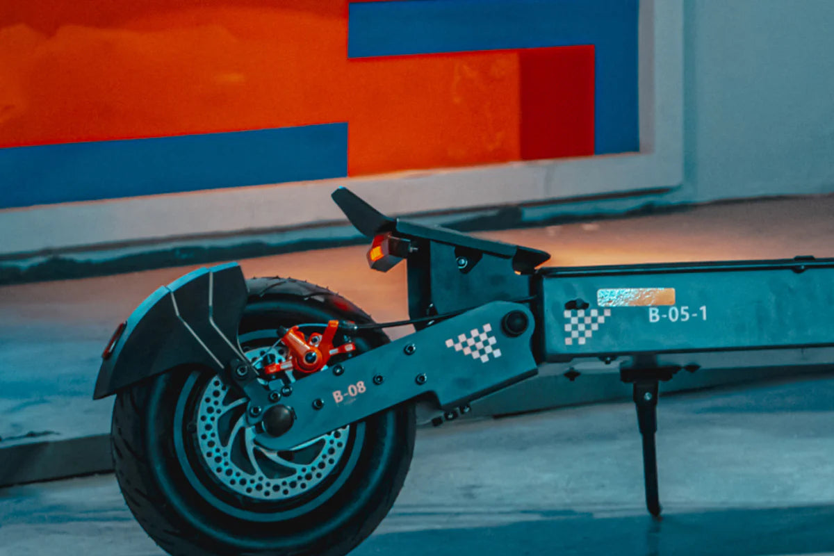 KUKIRIN G4 Electric Scooter Vancouver Close-up of a mechanical model with visible branding on a blurred background