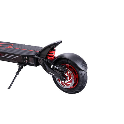 Close-up of an electric scooter's wheel and suspension system on a white background