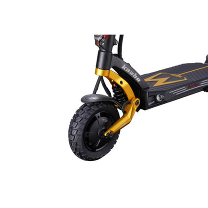 Close-up of a scooter wheel with gold suspension fork on a white background