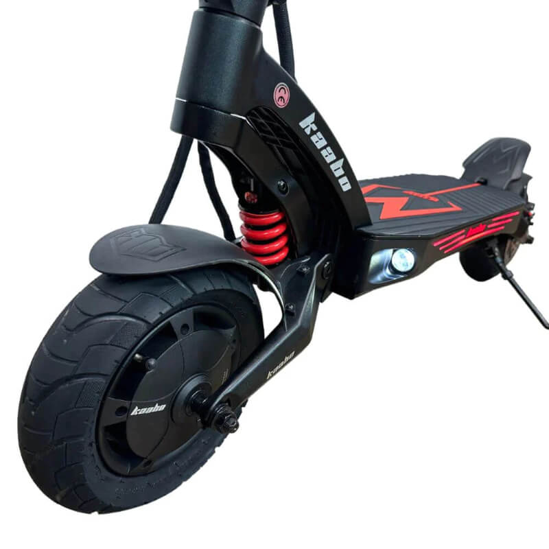 Black electric scooter with red accents on a white background