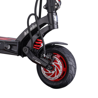 Close-up of a scooter wheel with red accents on a white background
