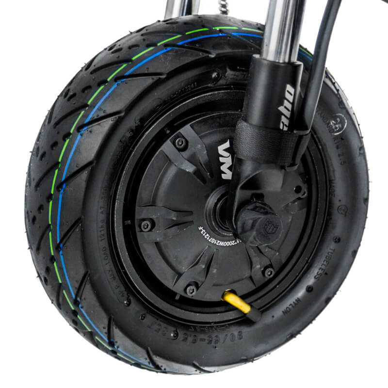 Close-up of the Kaabo Wolf King GT Pro's front wheel, featuring durable off-road tires and hydraulic brakes for enhanced safety and performance.