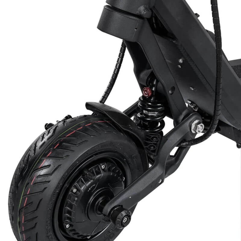 Close-up of a black electric scooter wheel and suspension system on a white background