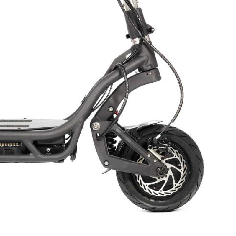 Close-up of a black electric scooter's rear wheel and suspension on a white background