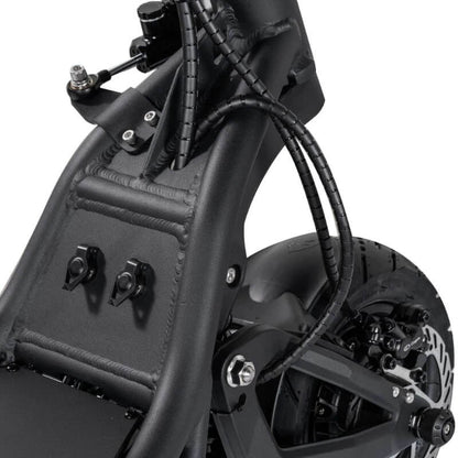 Close-up of a black electric bike frame with visible wiring and components.