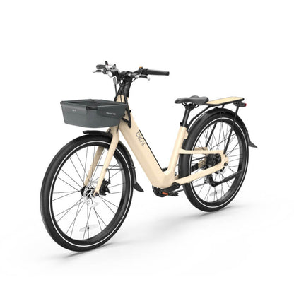 Beige electric bicycle with a black basket on a white background