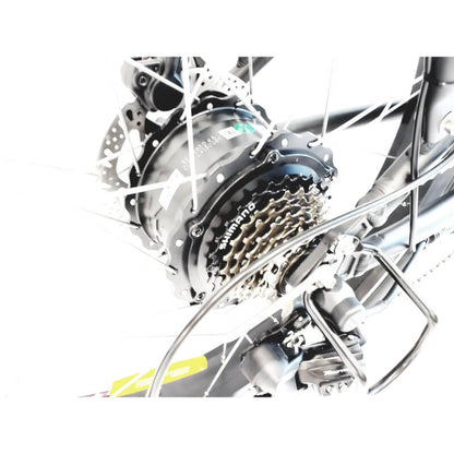Close-up of a bicycle gear system with Shimano branding on a white background