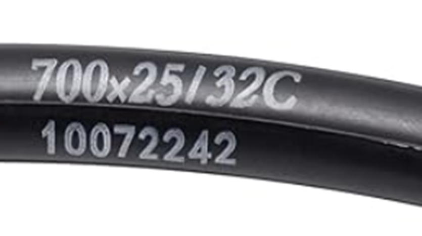 Black bicycle tube with size and serial number text on a white background