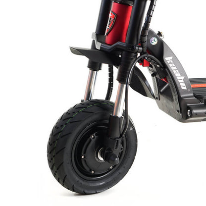 Close-up of the front wheel and suspension system of the Kaabo Wolf Warrior 11+ scooter, highlighting its durable build for off-road use