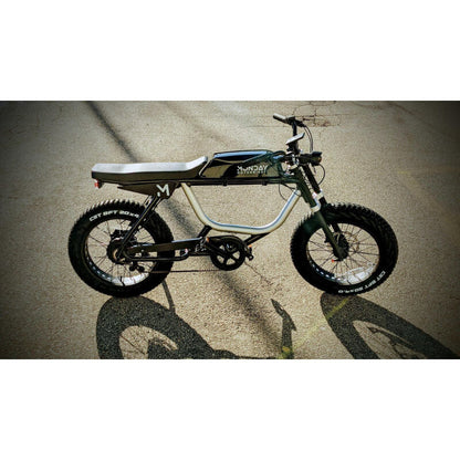 Small electric bike on a concrete surface