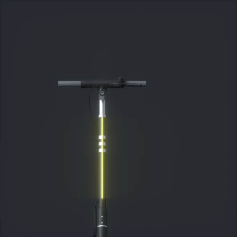Yellow scooter handlebar with black grip on a dark background